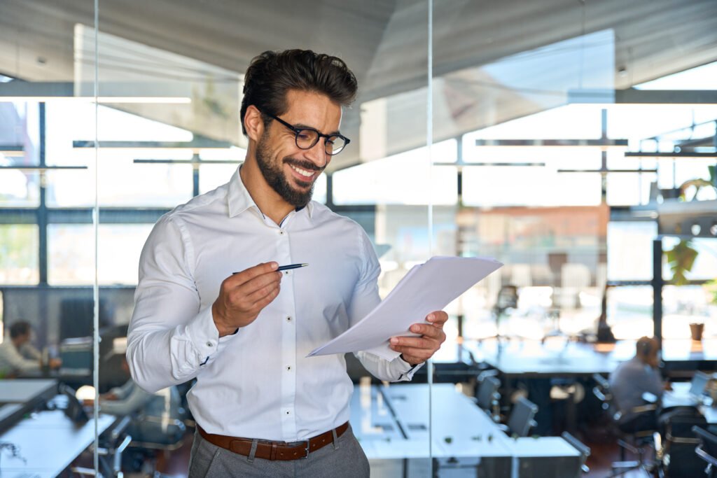accountancy partnership paperwork man smiling