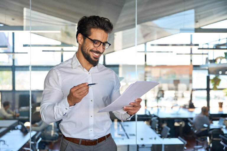 accountancy partnership paperwork man smiling