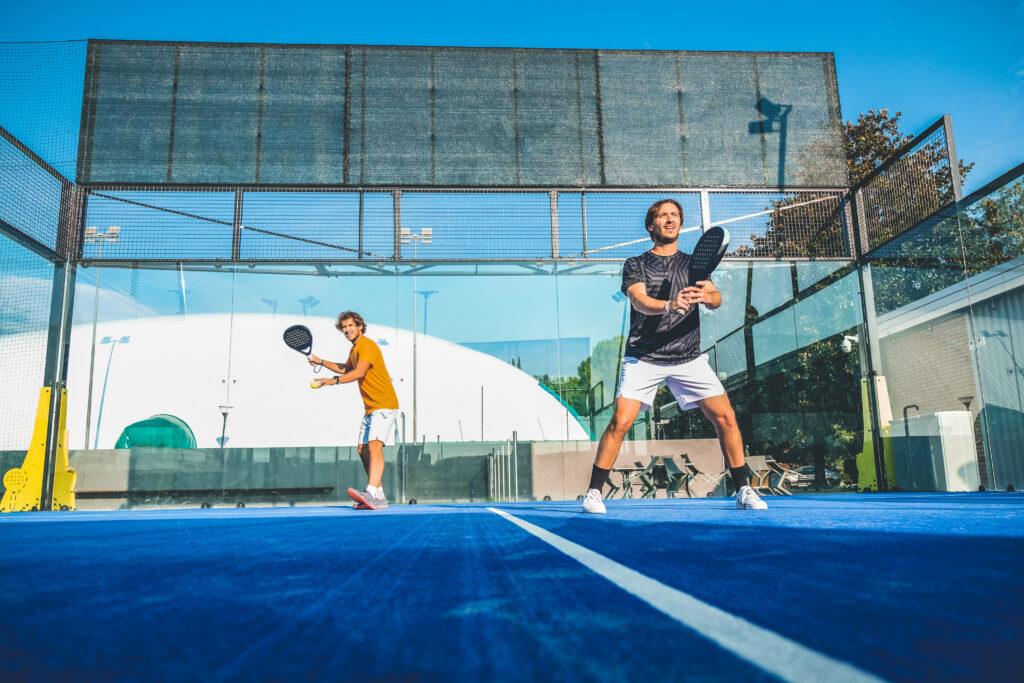 padel players on court