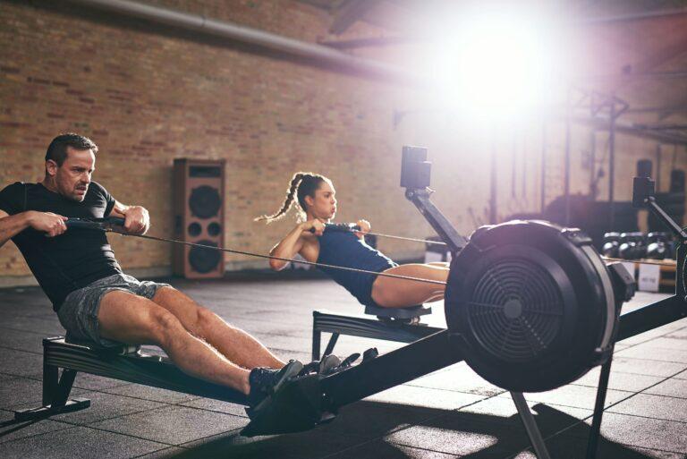 man and woman in HYROX gym