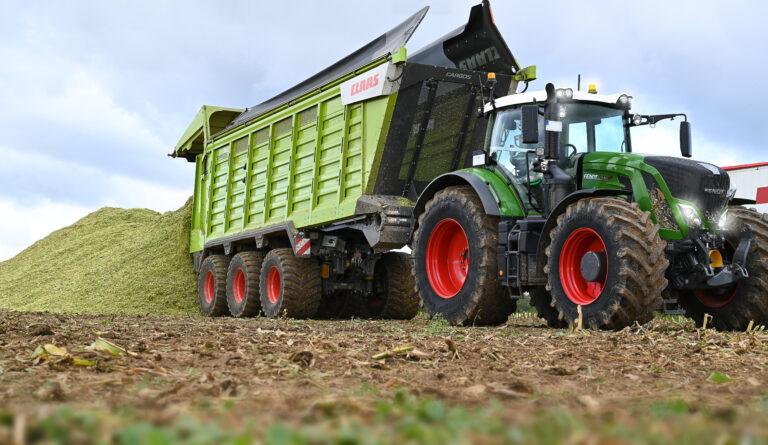 farming tractor moving seed
