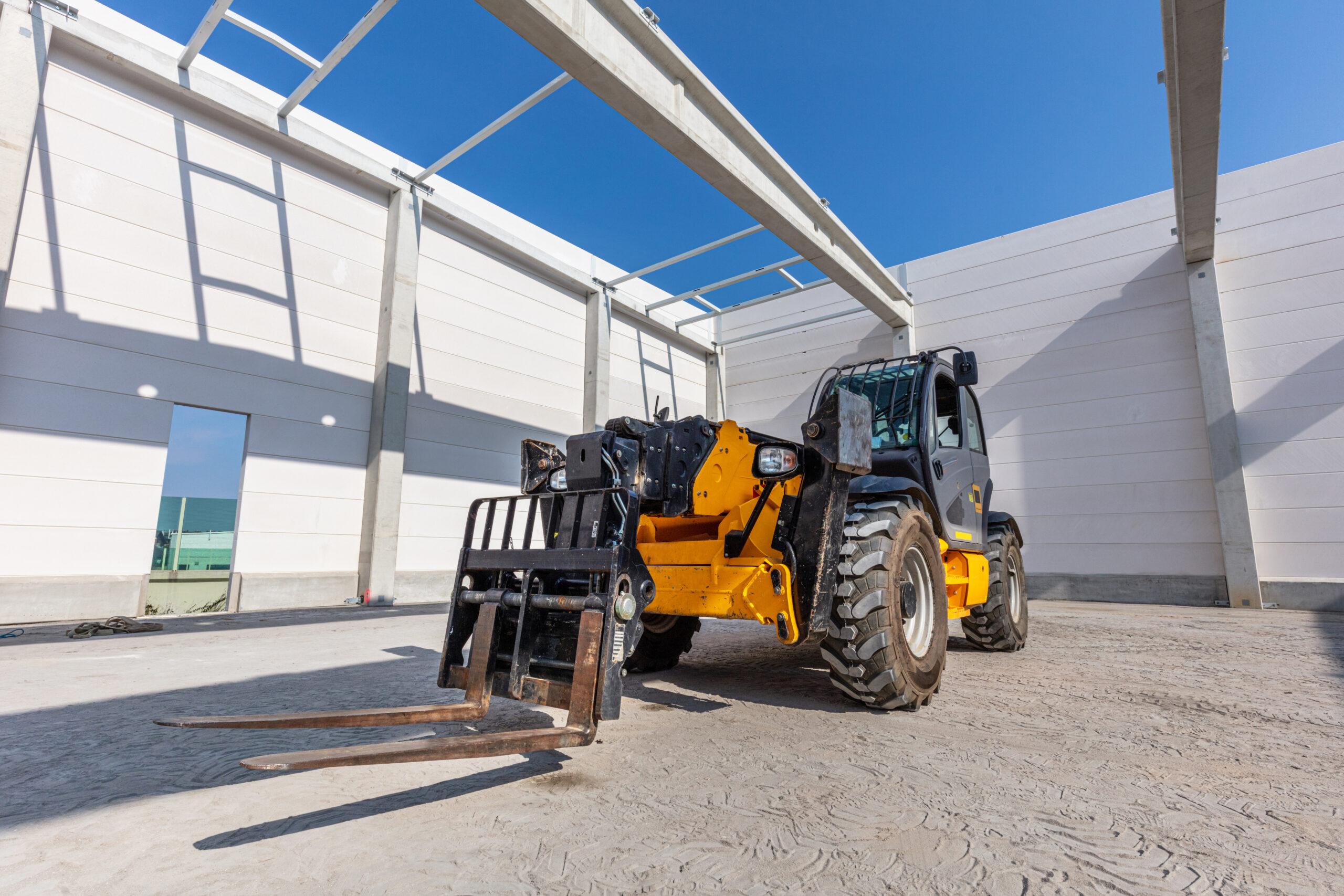 yard with telehandler in