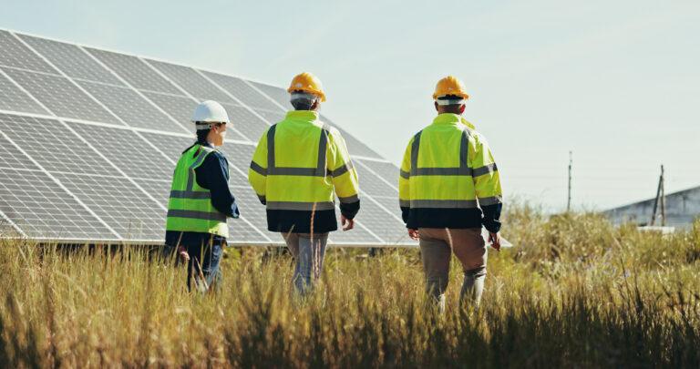 men in high vis on renewables site